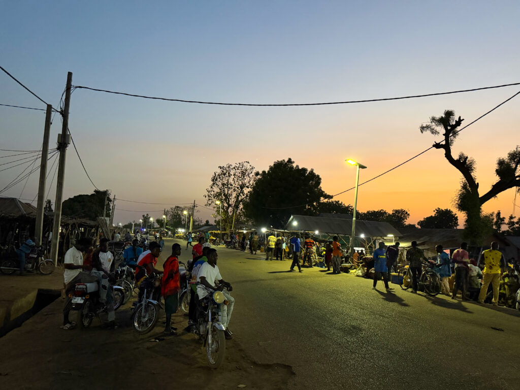Mararaba Damshin, Plateau State, Nigeria, enjoys longer business hours and improved nighttime safety thanks to Sosai Renewable Energies' solar minigrid. Photo by Sherwin Das 2026/09/Sosai-Mararaba-Damshin-Nigeria-scaled.jpg